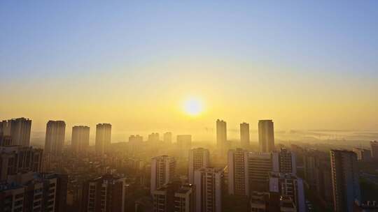 潼南城市日出云海翻腾江河城市和谐景象