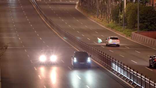 夜晚快速路隧道口车流马路行车亮化