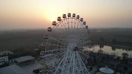 夕阳景区摩天轮秦风欢乐谷游乐场玩乐航拍2