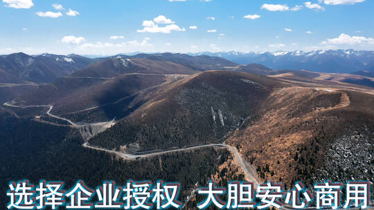 山路视频川西高原山区蜿蜒公路森林远处雪山