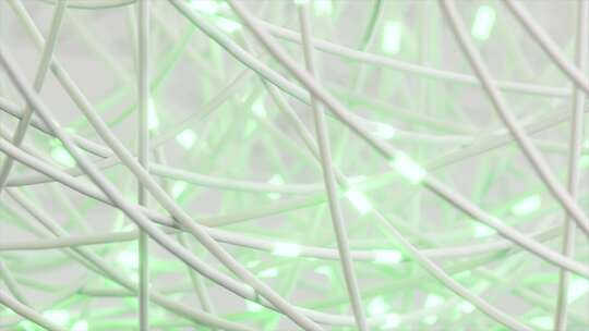 交织的白色电线与柔和的绿色亮点在混乱的网