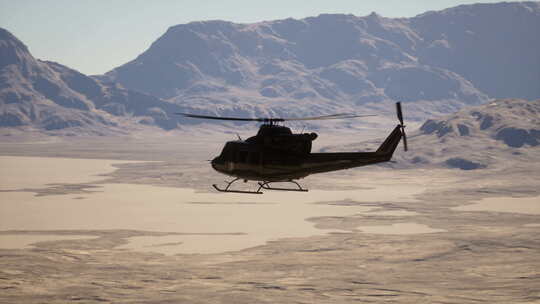 直升机在山脉上空飞行视频素材模板下载