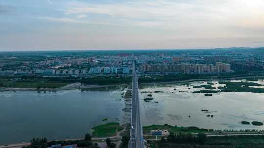葫芦岛绥中县六股河大桥和城市航拍延时