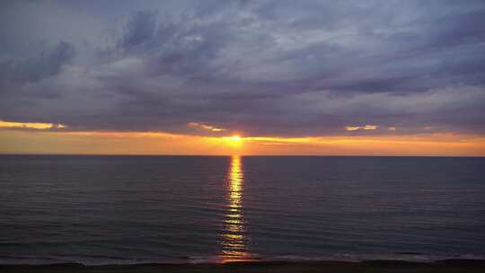 海边日落海上落日海面夕阳火烧云海岸