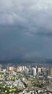 竖版航拍城市夏季暴雨来临湖南怀化