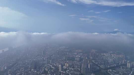 云海下的城市高楼四川乐山航拍