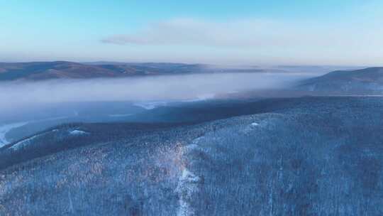 航拍林海雪原高山雾凇晨光冻雾