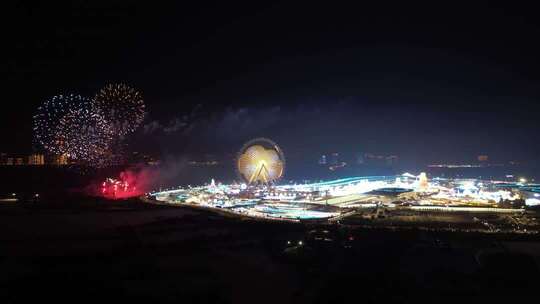 4K哈尔滨冰雪大世界摩天轮夜景烟花航拍