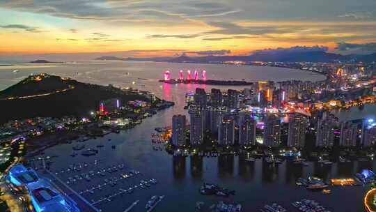 海南三亚三亚湾日落自贸港城市夜景唯美