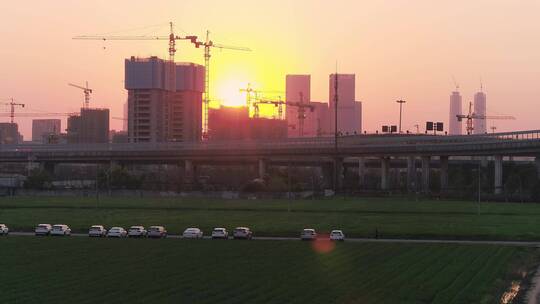 航拍夕阳杭州萧山钱江世纪城机场城市大道