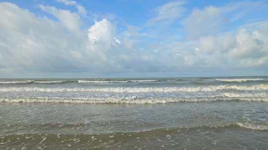 蓝天白云下广西北海大海沙海岸线风景风光