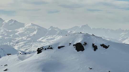 航拍雪山雪景山峰冬天企业精神励志登山