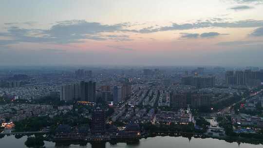 夕阳下的眉山城市风光航拍