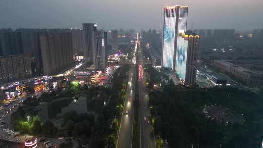 河南新乡市城市夜幕降临夜景灯光航拍