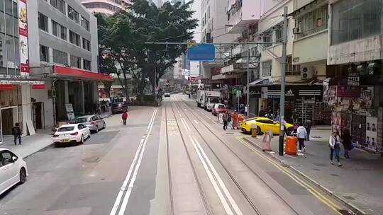 有轨电车上拍摄 香港道路大街的车辆行人
