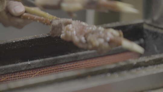 西安小吃回民街空镜拍摄特写美食烤串烧烤视频素材模板下载