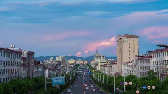 城市日落夕阳火烧云延时县城城区航拍延时