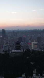 竖版航拍贵阳东山寺晚霞夜幕降临