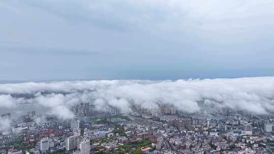 江西省九江市春季雨后烟云下的城市景观航拍