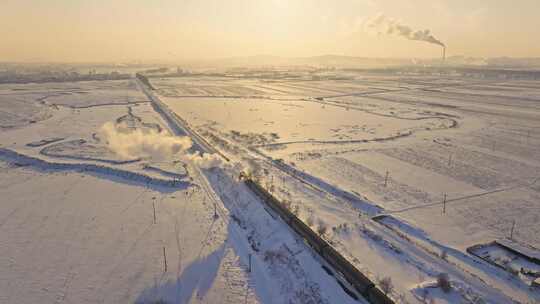 航拍中国东北冬季雪景中的蒸汽机车老火车