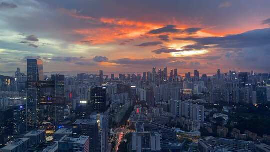 城市高楼夜景夕阳云朵