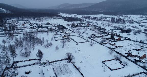 航拍冬季大兴安岭雪村人家