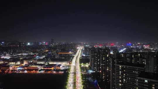 夜晚城市道路交通航拍下班车流路况夜景