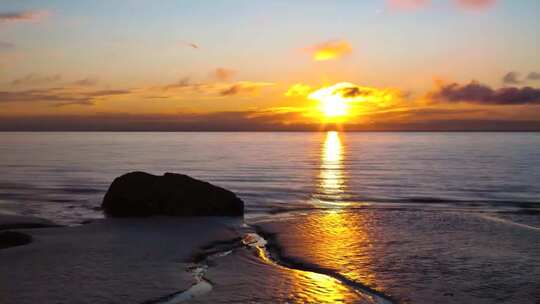 海上日落朝西夕阳