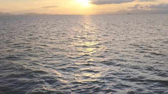 4k海面金色夕阳日落光线地平线海平面航拍视频素材模板下载