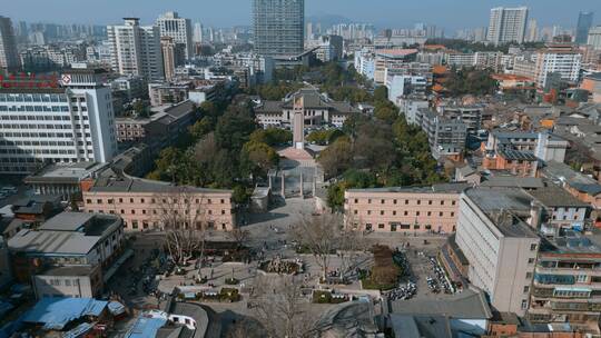 云南旅游昆明抗战胜利堂光华街酒杯楼远景视频素材模板下载