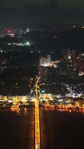 竖屏航拍四川乐山岷江两岸夜幕降临夜景