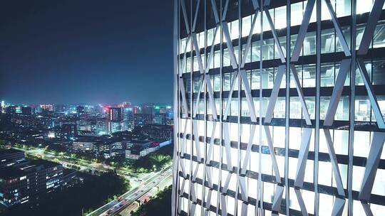 航拍夜晚杭州滨江灯火通明的现代办公大楼
