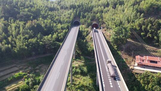 高速公路汽车进出隧道航拍高架桥货车高速路