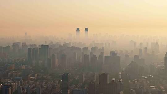 中国河南郑州清晨日出晨雾城市风光航拍