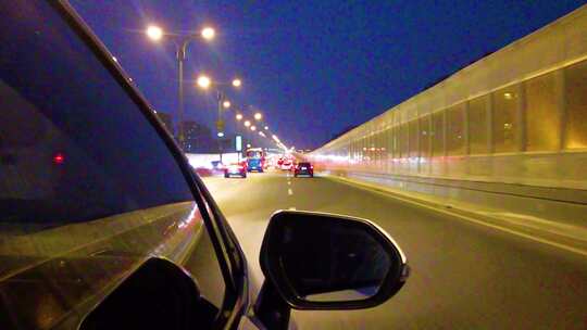 城市夜晚汽车在马路行驶夜景视频素材