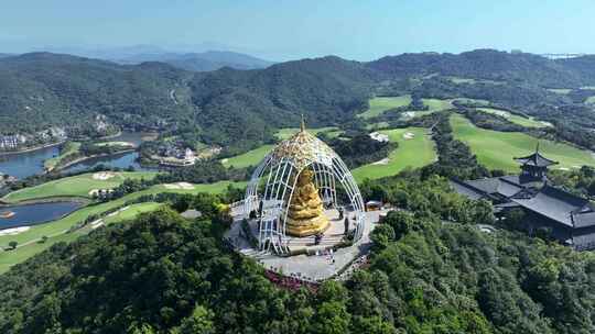 航拍深圳大华光寺山顶四面观音大佛像视频素材模板下载