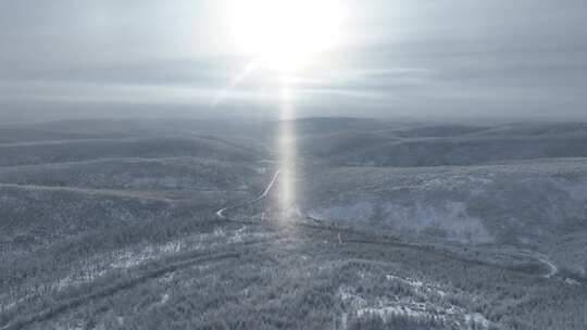 航拍冬季阳光雪色山林