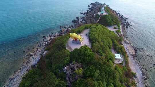 航拍海南三亚西岛海洋文化旅游区海浪礁石