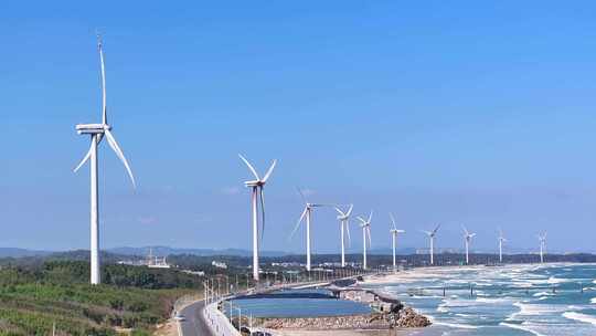 航拍福建漳州东山岛海岸线新能源风力发电