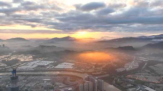 航拍深圳福田香港落马洲日出金光视频素材模板下载