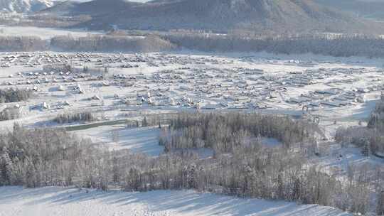 无人机航拍冬日新疆禾木雪景村庄