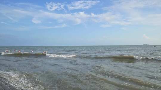 蓝天白云下广西北海大海沙海岸线风景风光