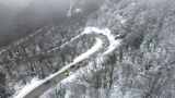 冬天暴雪纷飞森林下雪雪景霜降立冬大雪航高清在线视频素材下载