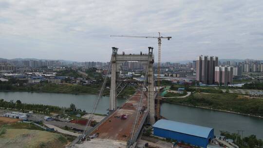 航拍城市在建跨河大桥施工