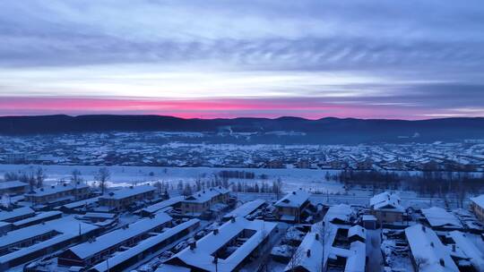 航拍大兴安岭雪村灿烂夕阳