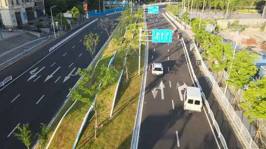 航拍城市公路汽车行驶