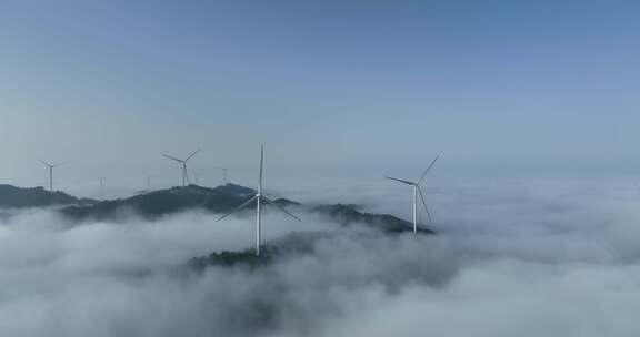 美丽云海山峰中的风力发电机组航拍