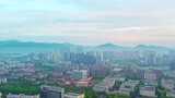 日出中的杭州滨江建筑风景航拍高清在线视频素材下载