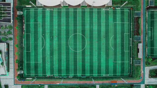 4k航拍深圳全民健身体育场足球运动视频