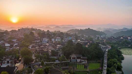 贵州贵阳青岩古镇清晨迷雾日出朝阳延时摄影